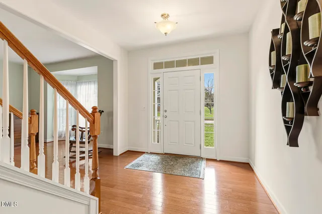 a view of a livingroom with furniture and a window