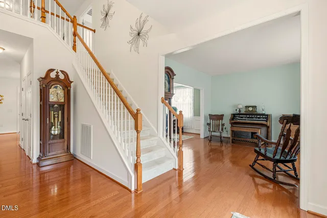 a view of a livingroom with furniture and lounge chair