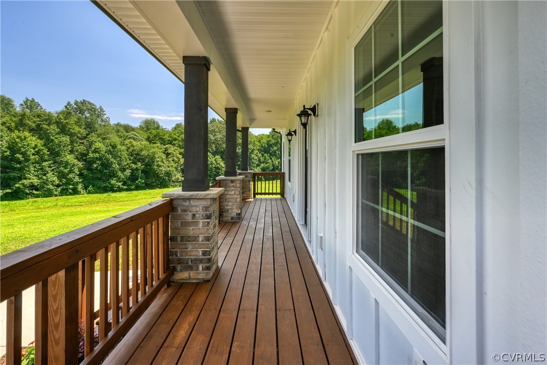 694 Gardners Road Mineral, VA 23117 - Photo 3 of 41 a view of balcony with wooden floor and fence