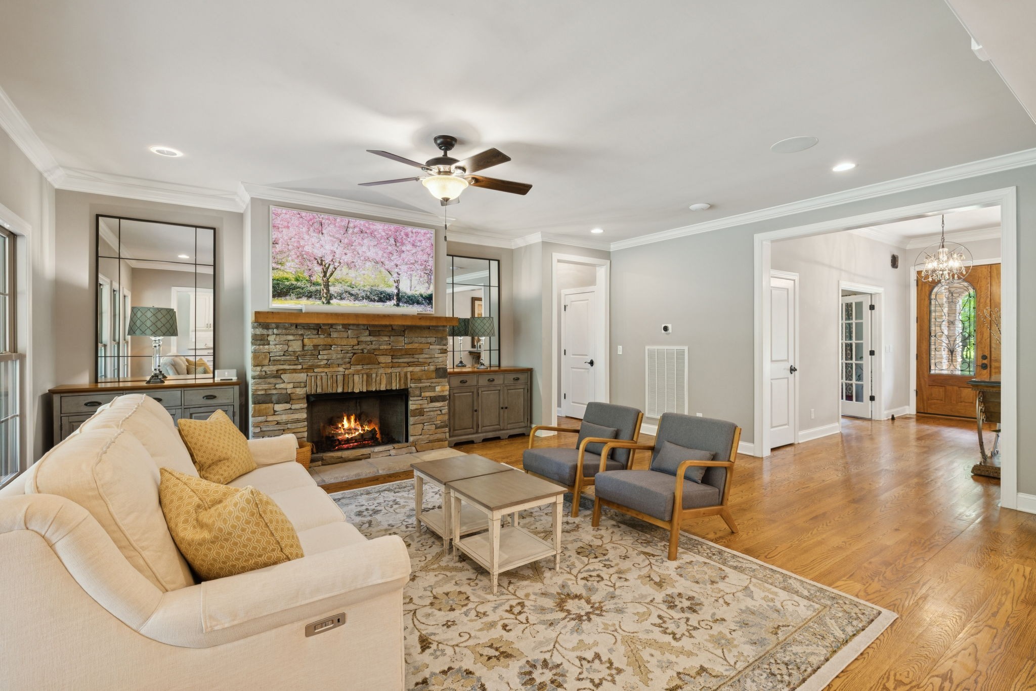 7270 Old Franklin Road Fairview, TN 37062 - Photo 12 of 96 a living room with furniture and a fireplace