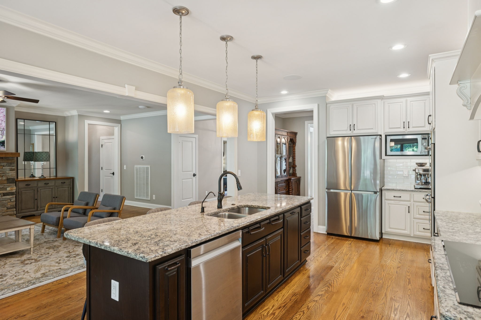 7270 Old Franklin Road Fairview, TN 37062 - Photo 23 of 96 a kitchen with stainless steel appliances granite countertop a sink refrigerator and cabinets