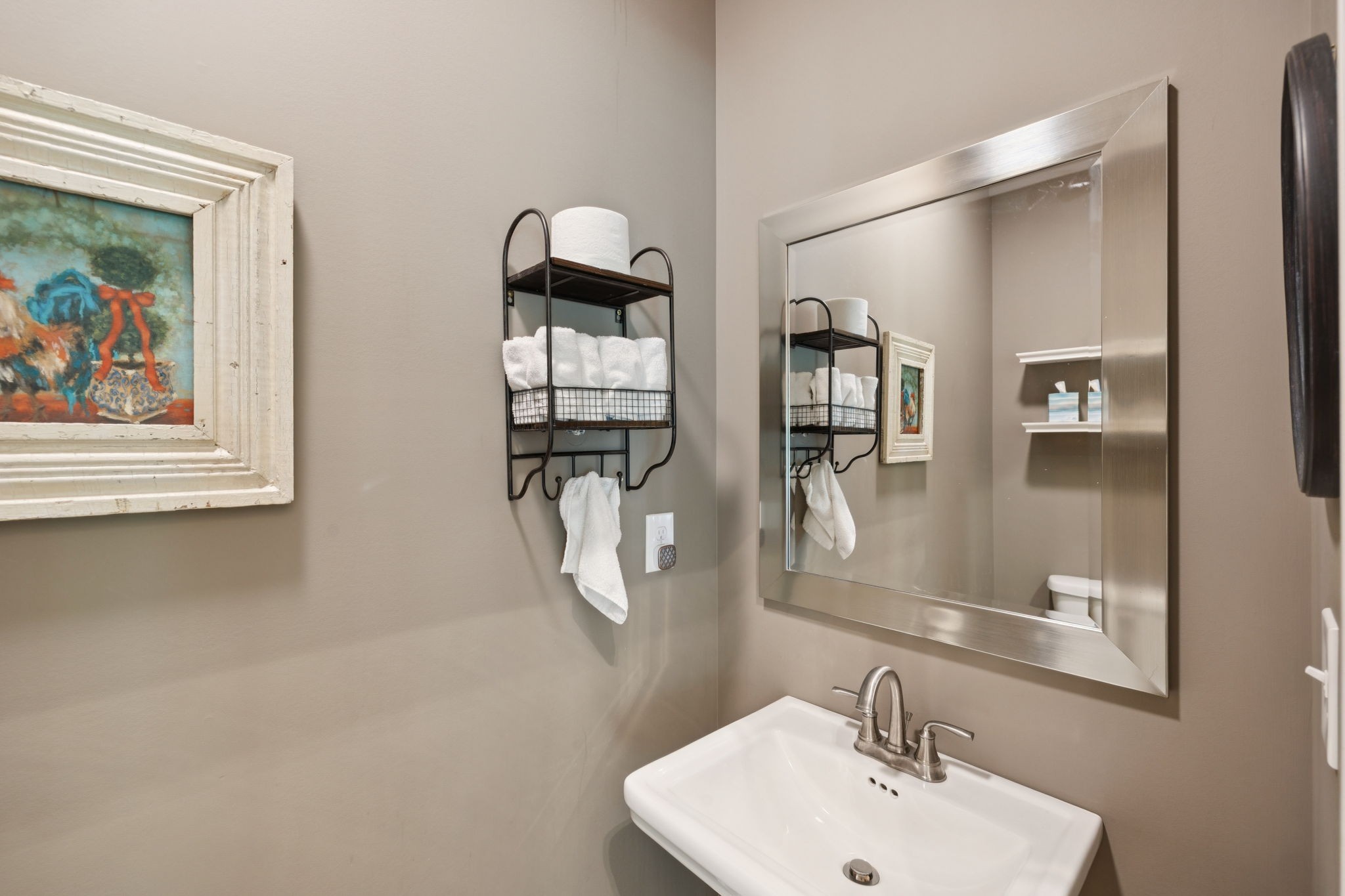 7270 Old Franklin Road Fairview, TN 37062 - Photo 30 of 96 a bathroom with a sink and mirror