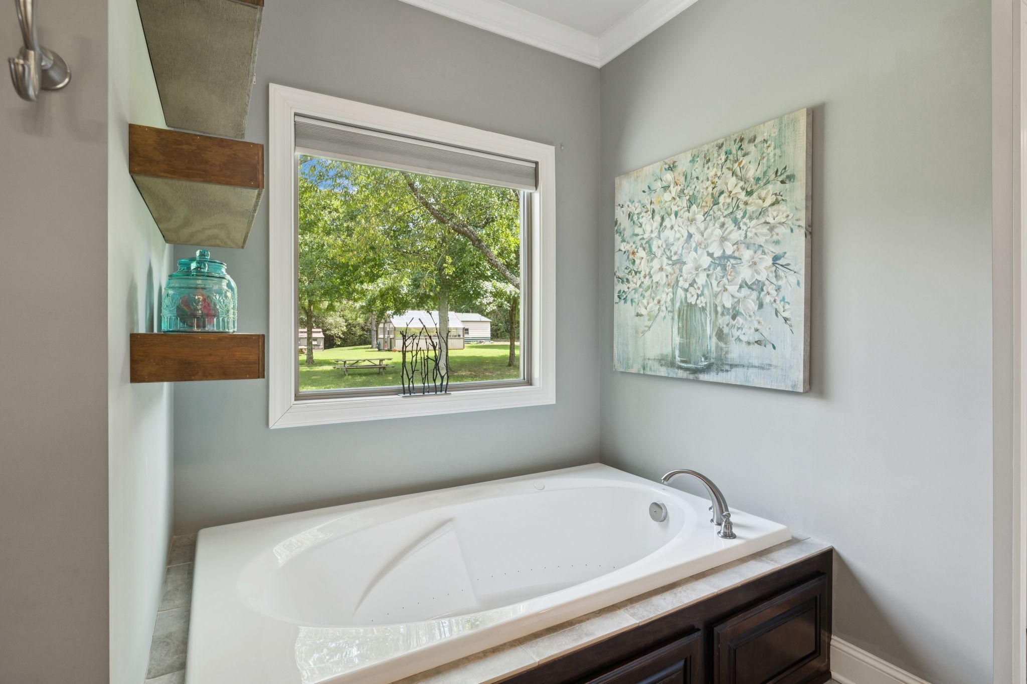 7270 Old Franklin Road Fairview, TN 37062 - Photo 35 of 96 a bath tub sitting in a bathroom next to a window