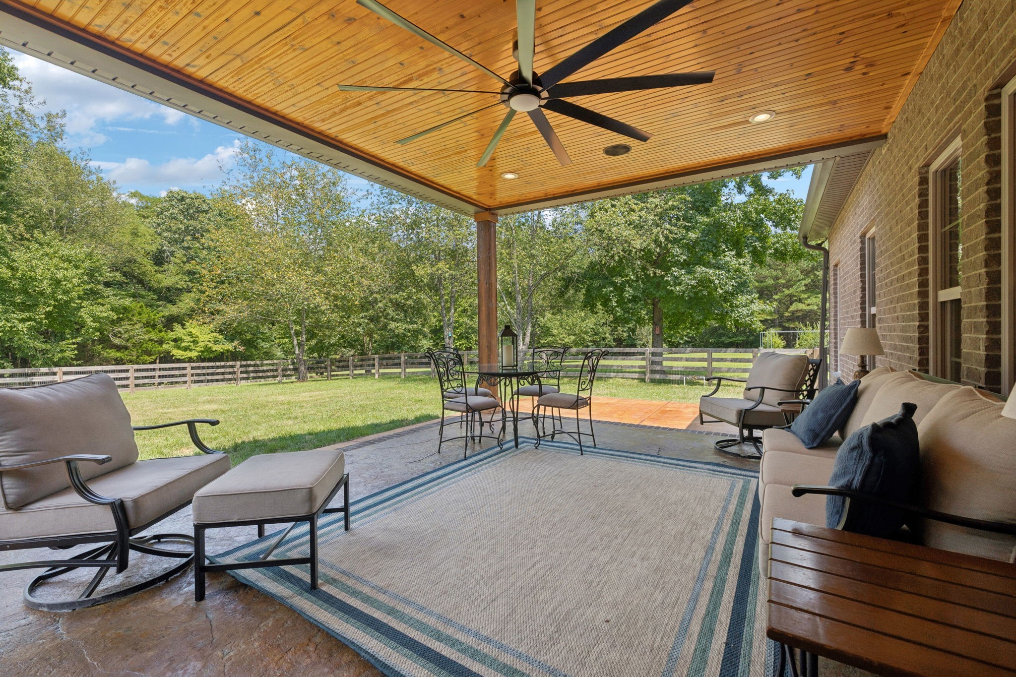 7270 Old Franklin Road Fairview, TN 37062 - Photo 56 of 96 a view of a chairs and table in patio with a lake view