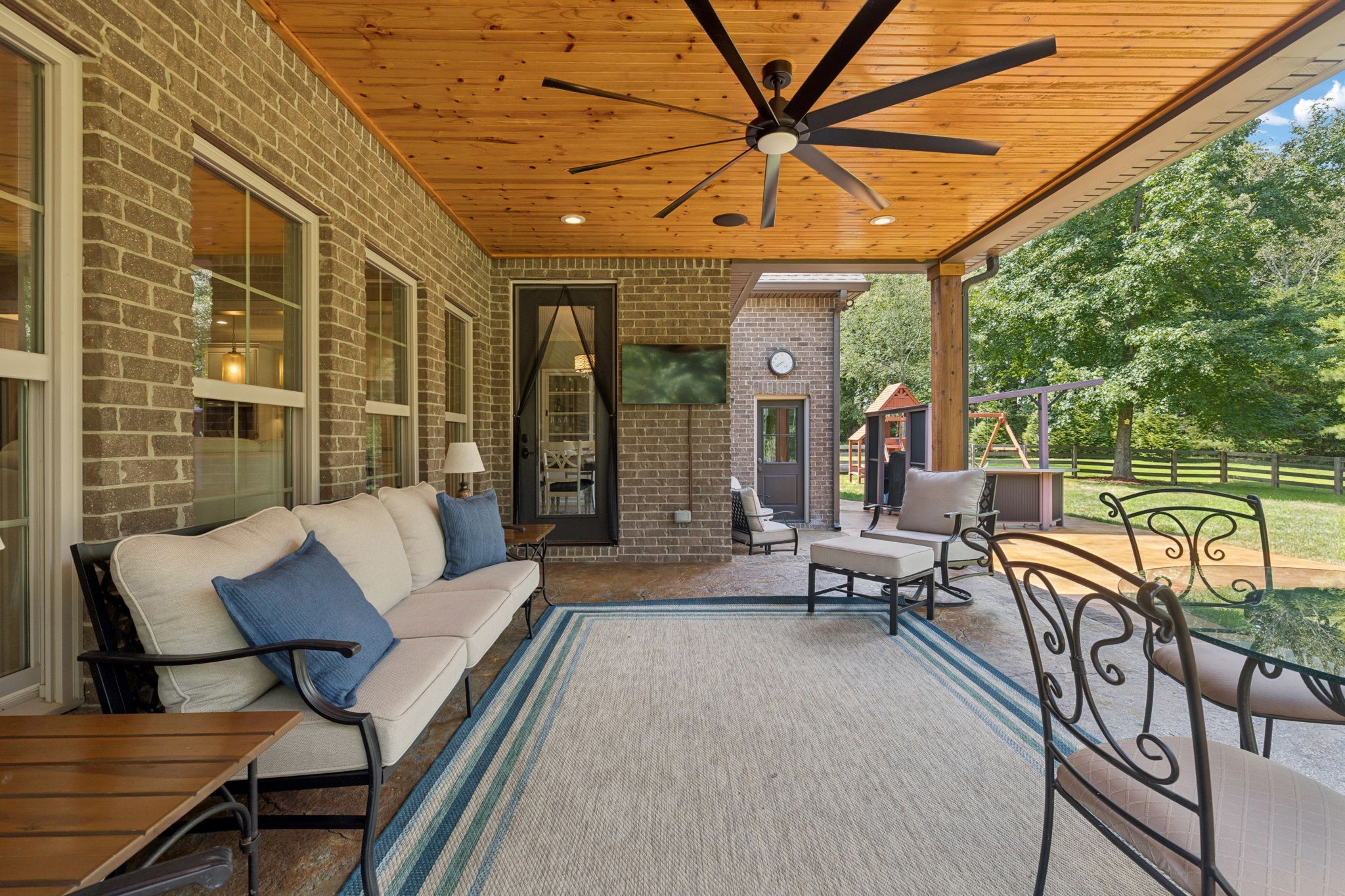 7270 Old Franklin Road Fairview, TN 37062 - Photo 57 of 96 a outdoor space with patio the couches and a potted plant on a table
