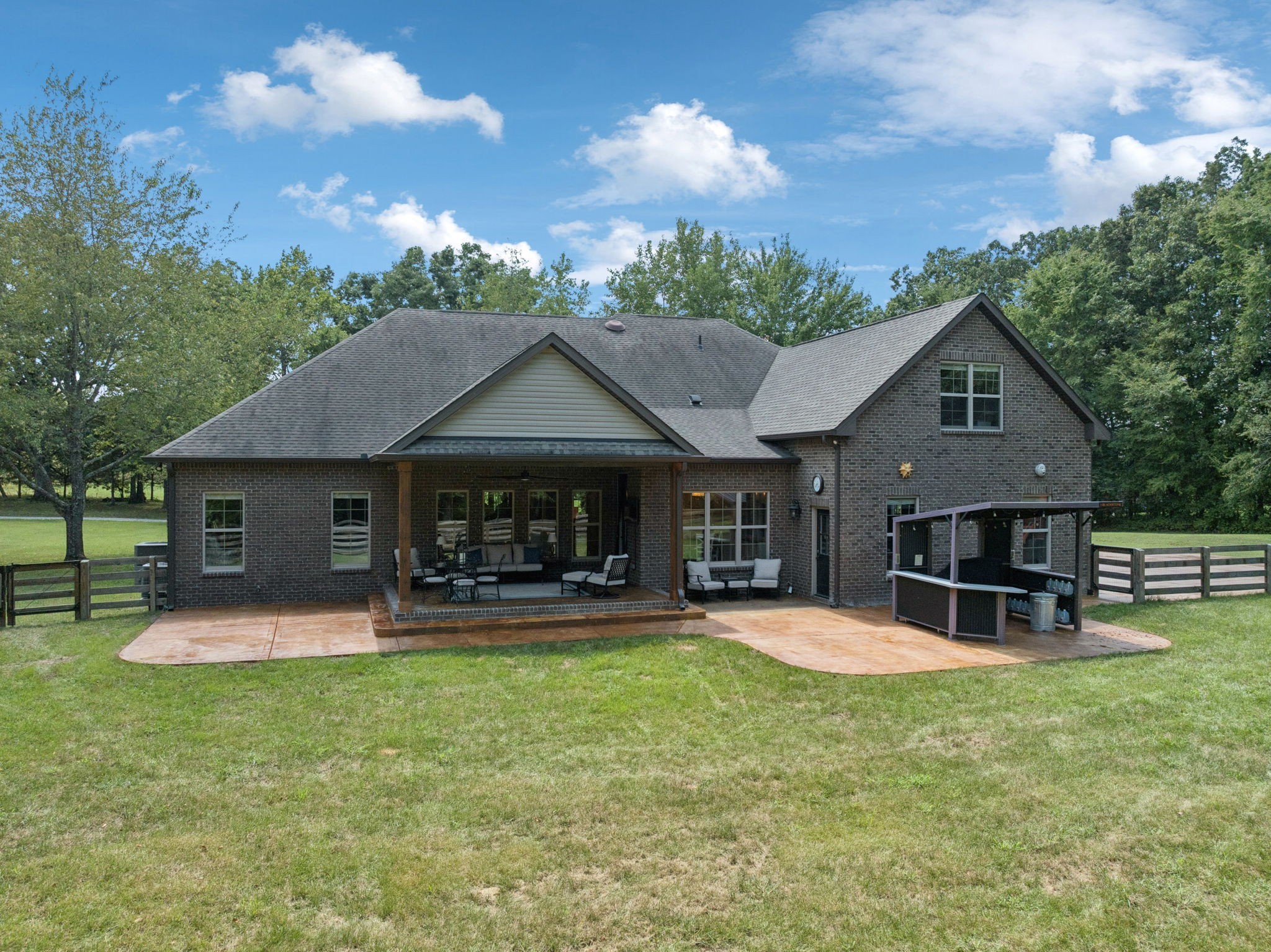 7270 Old Franklin Road Fairview, TN 37062 - Photo 78 of 96 front view of a house with a yard patio and a garden