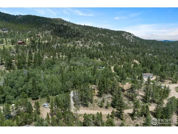 a view of city and green space