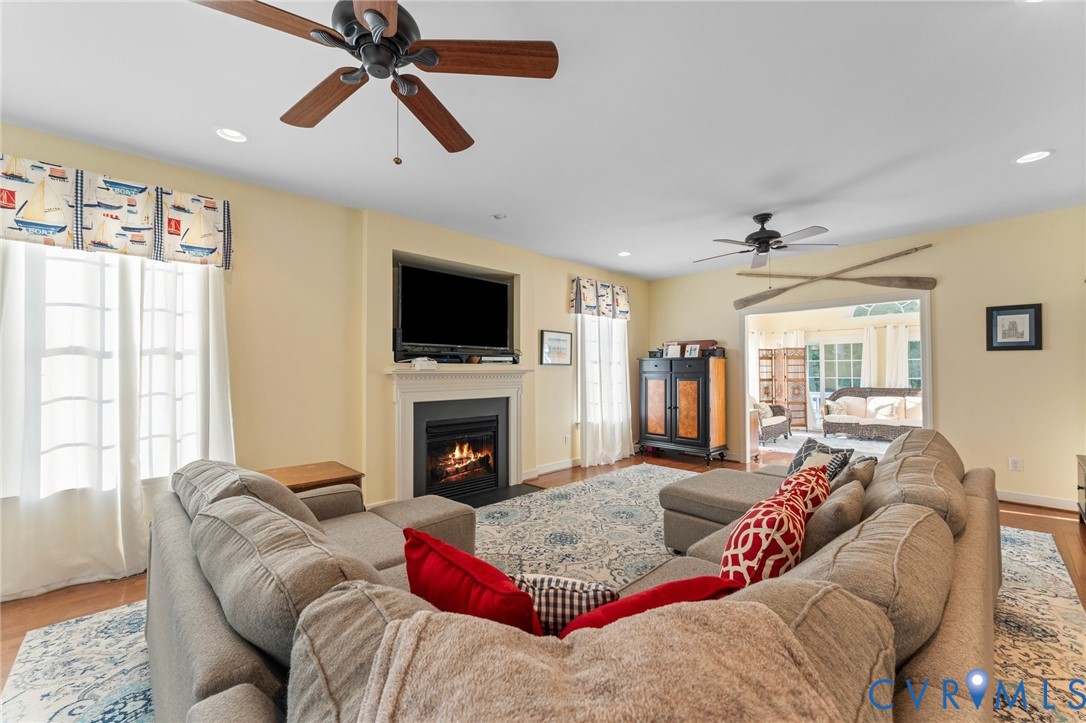 480 Rockingham Road Dunnsville, VA 22454 - Photo 15 of 41 a living room with furniture or couch and a flat screen tv