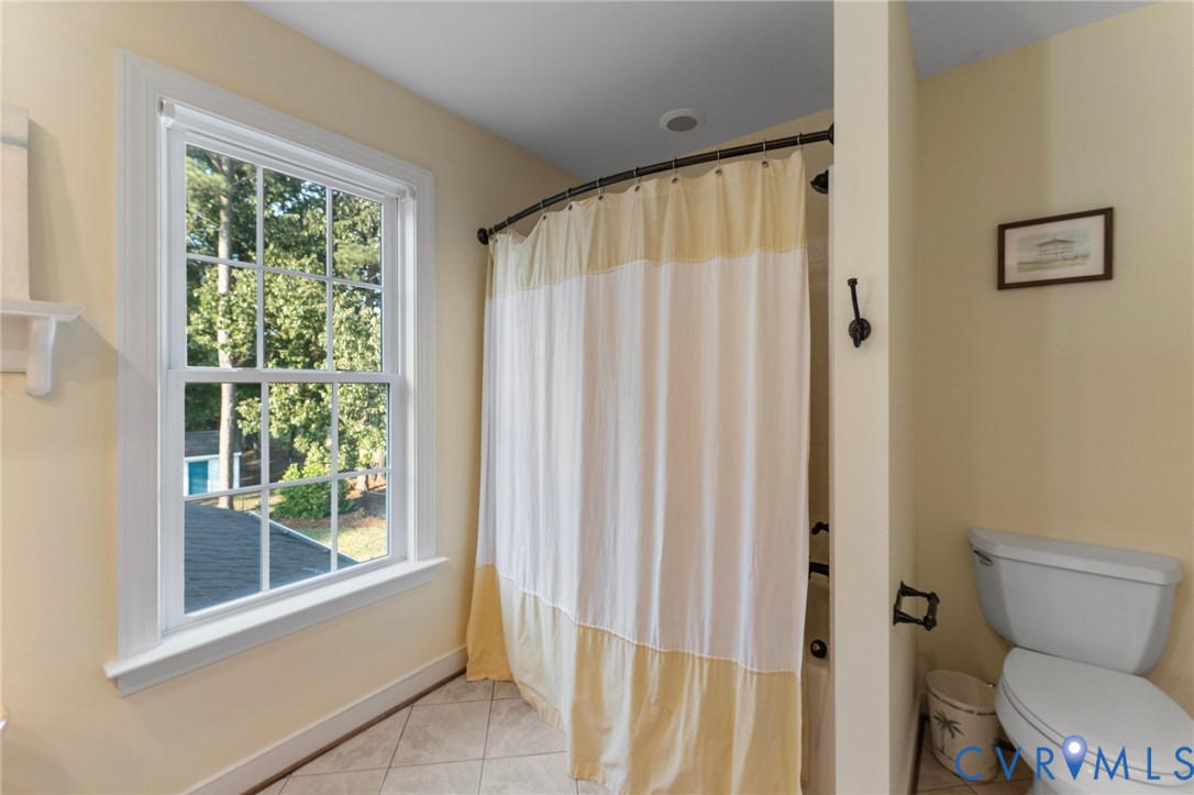 480 Rockingham Road Dunnsville, VA 22454 - Photo 29 of 41 a bathroom with a toilet and a shower
