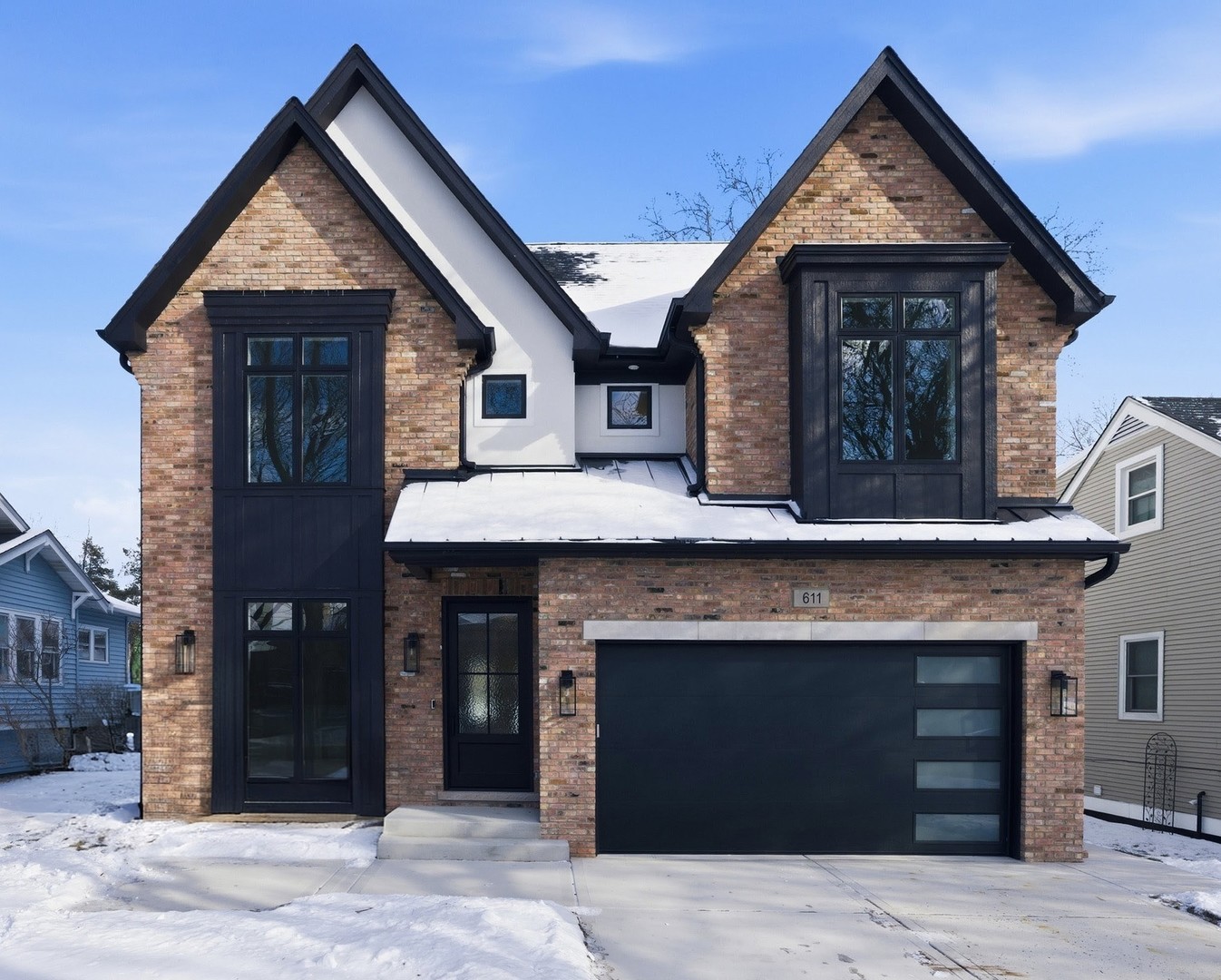 a front view of a house with a garage
