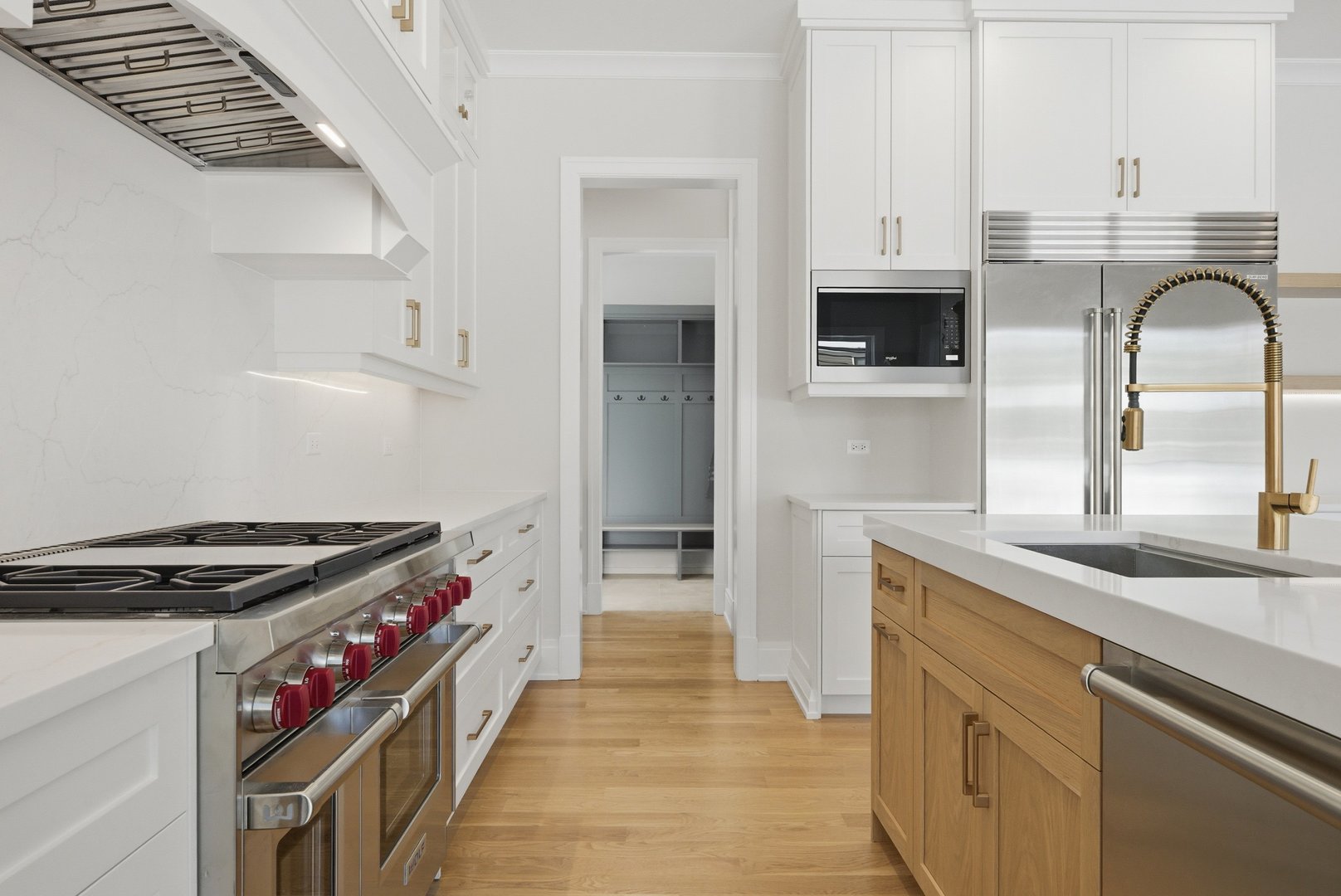 611 South Prospect Avenue Elmhurst, IL 60126 - Photo 6 of 28 a kitchen with granite countertop a sink stainless steel appliances and cabinets
