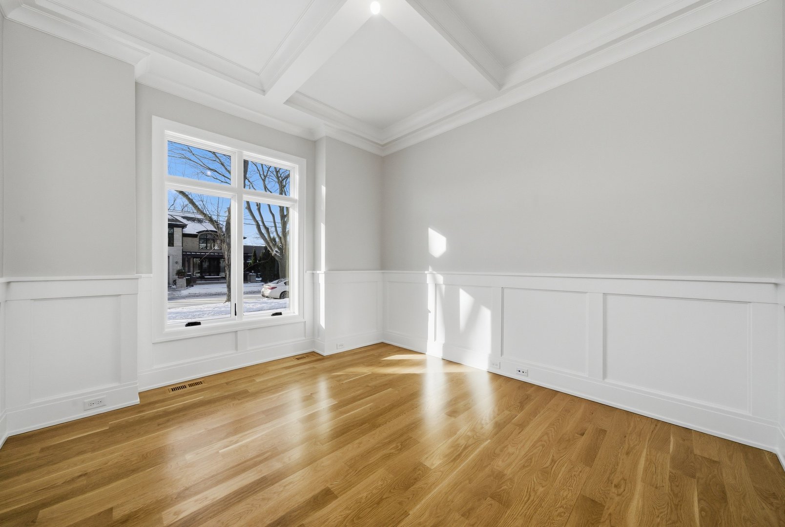 611 South Prospect Avenue Elmhurst, IL 60126 - Photo 9 of 28 a view of an empty room with wooden floor and cabinet