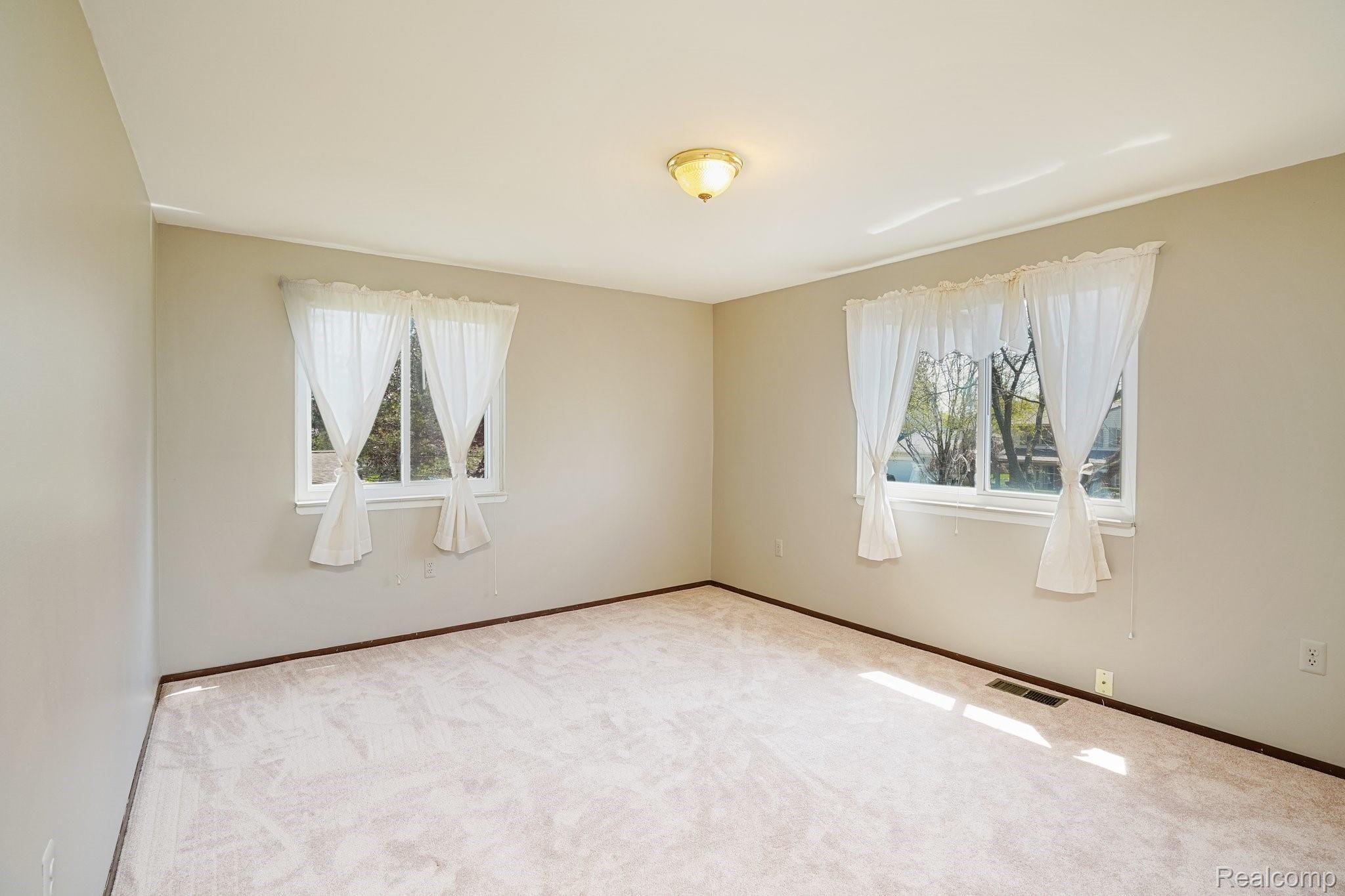 691 Abbey Court Rochester, MI 48307 - Photo 32 of 39 Large Fourth Bedroom - New Paint & Carpet (2021)