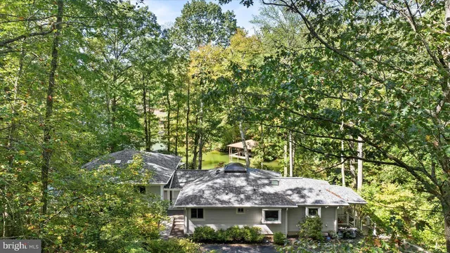 a kitchen with a sink and a large window