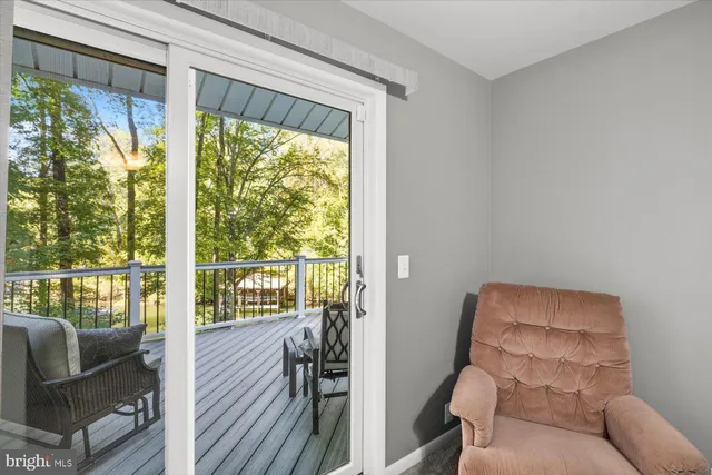 a view of balcony with furniture