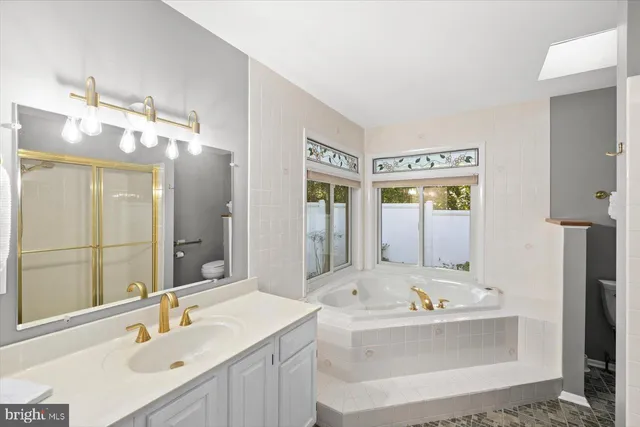 a view of a lake with a house in the background