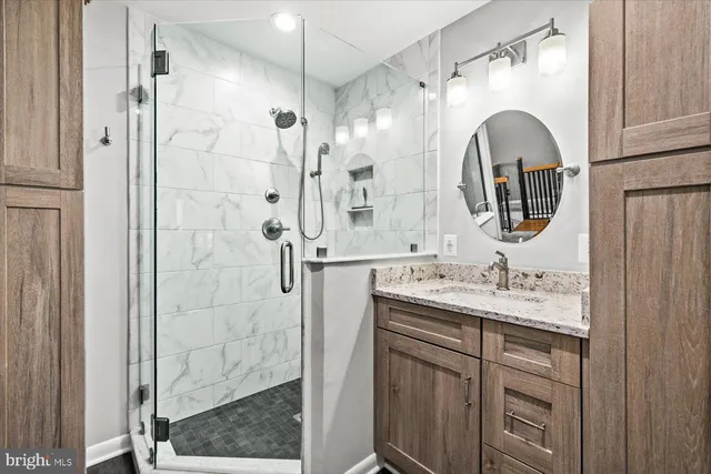 an aerial view of a houses with ocean view