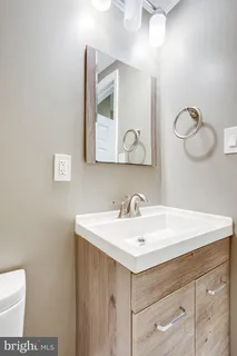 a view of balcony with wooden floor and outdoor space