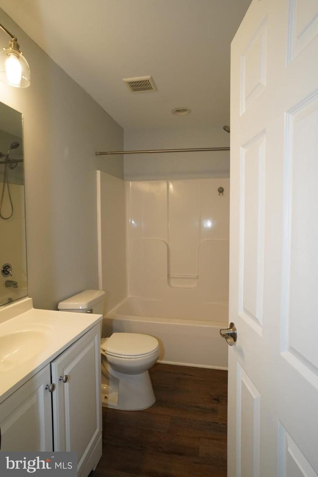 1217 Steed Street Ranson, WV 25438 - Photo 12 of 23 a bathroom with a sink a toilet and shower