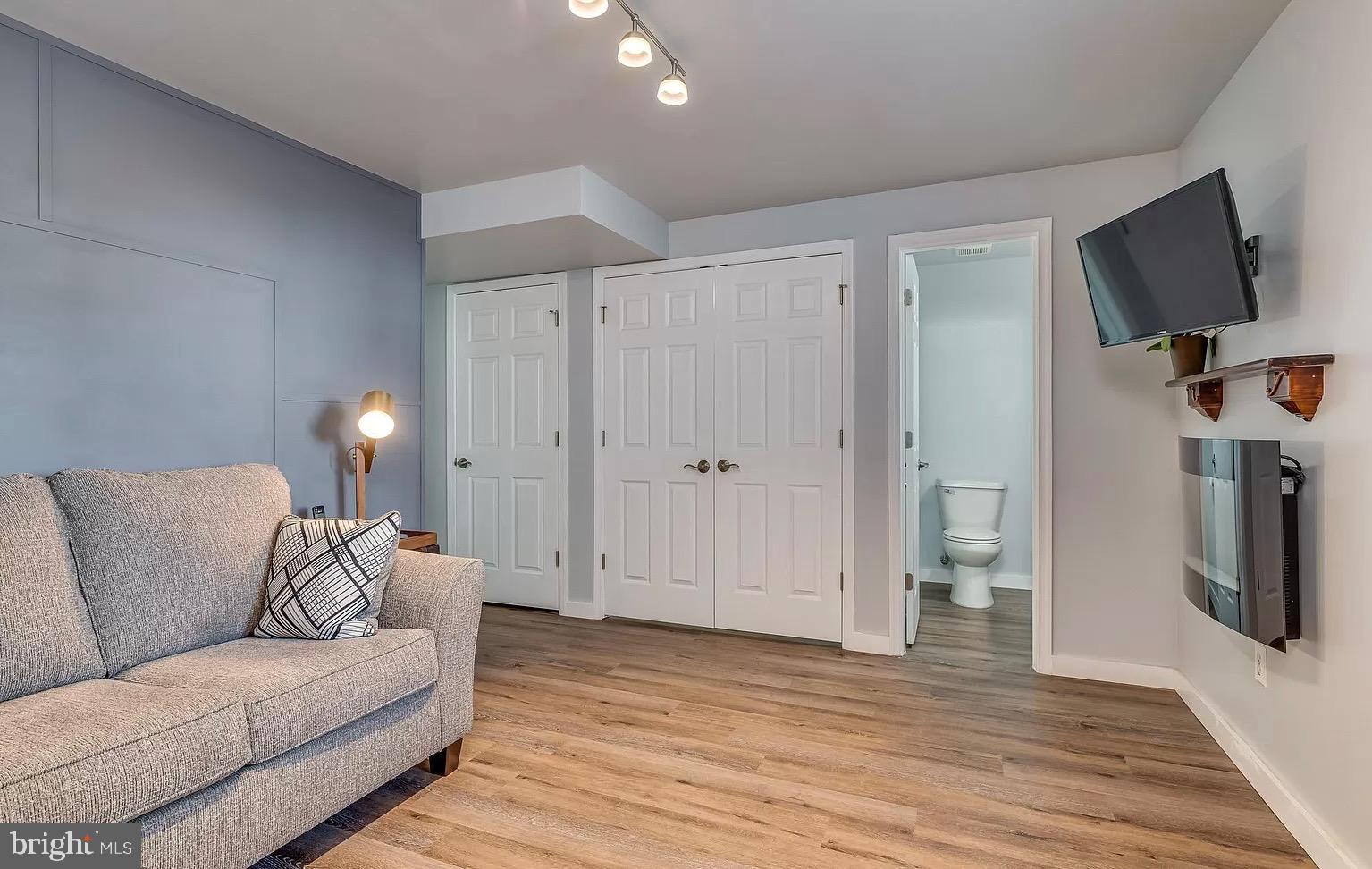 1217 Steed Street Ranson, WV 25438 - Photo 15 of 23 a living room with furniture and a flat screen tv