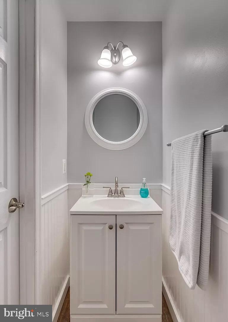 1217 Steed Street Ranson, WV 25438 - Photo 19 of 23 a bathroom with a sink and a mirror