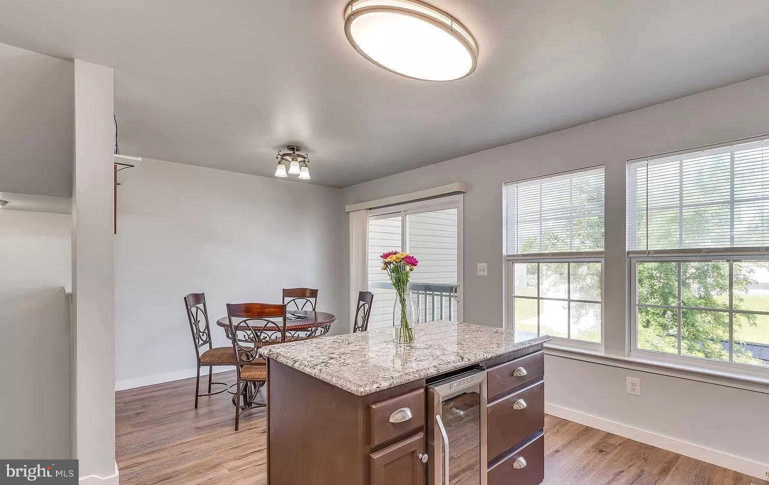 1217 Steed Street Ranson, WV 25438 - Photo 5 of 23 a kitchen with a table and chairs in it
