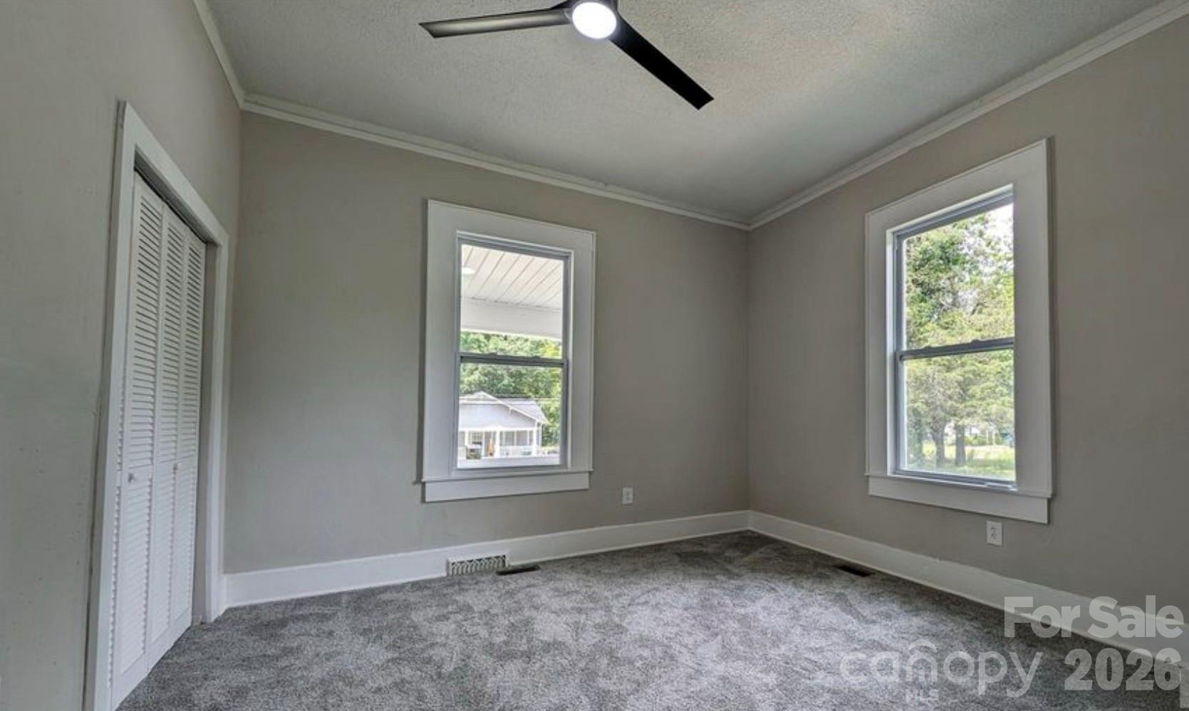 113 Brawley Street Chester, SC 29706 - Photo 5 of 12 a view of an empty room with a window