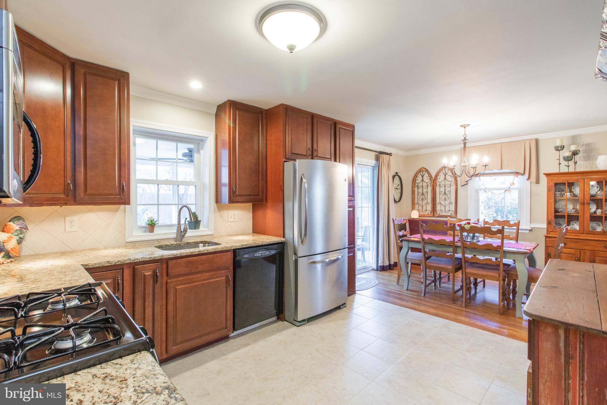 608 Palairet Road Philadelphia, PA 19128 - Photo 9 of 34 Open concept kitchen and dining room