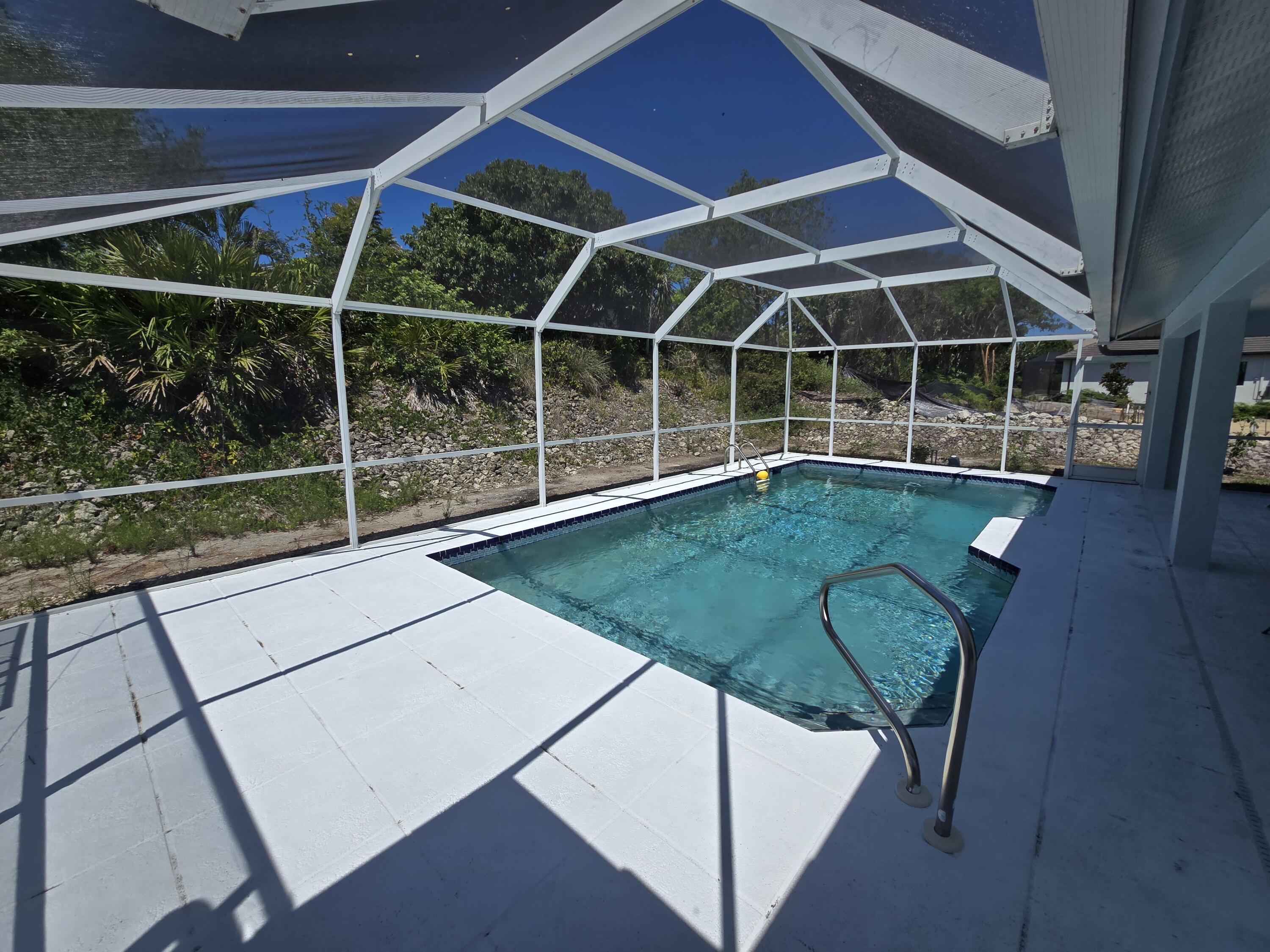 2049 San Marco Road Marco Island, FL 34145 - Photo 24 of 71 Awesome Pool Deck to Enjoy the Sun!