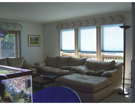 2 Regis Road Andover, MA 01810 - Photo 4 of 9 a living room with furniture and a window