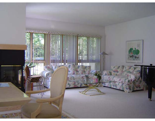 2 Regis Road Andover, MA 01810 - Photo 6 of 9 a living room with furniture and a flat screen tv
