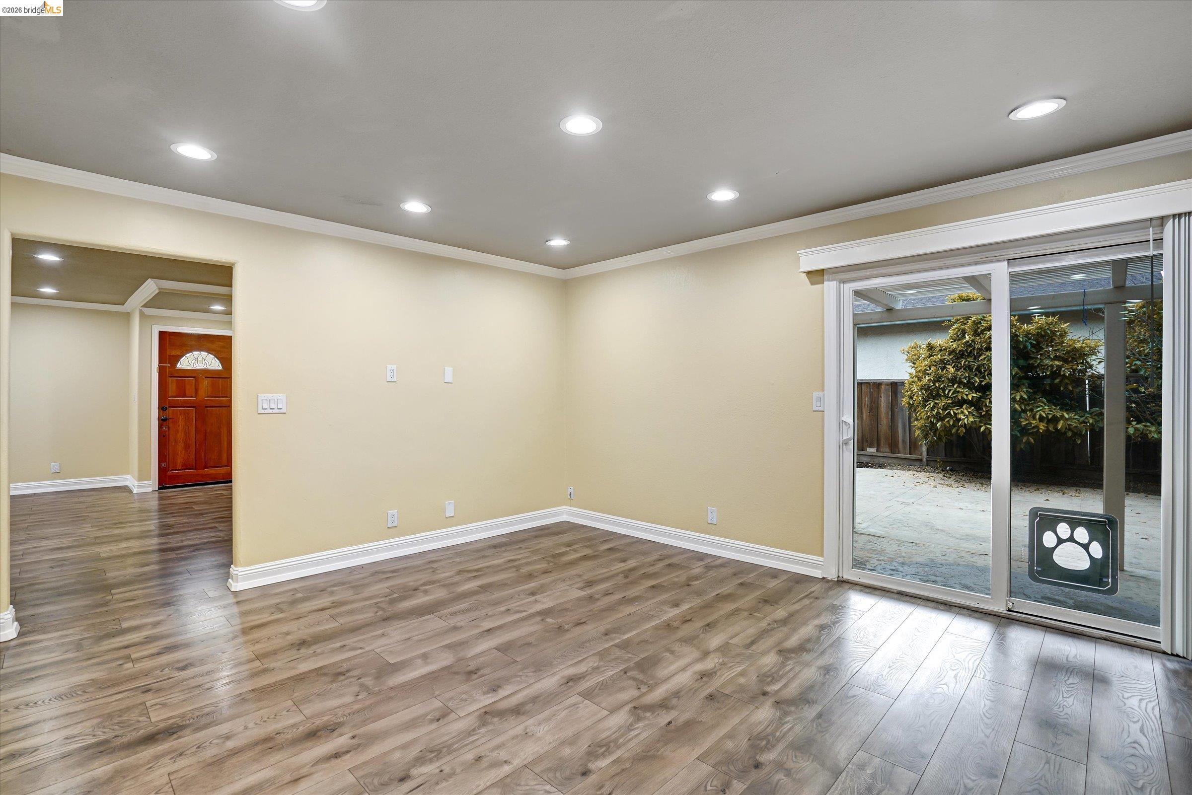 108 Castleton Court San Ramon, CA 94583 - Photo 15 of 41 Empty room with recessed lighting, dark wood finished floors, and crown molding