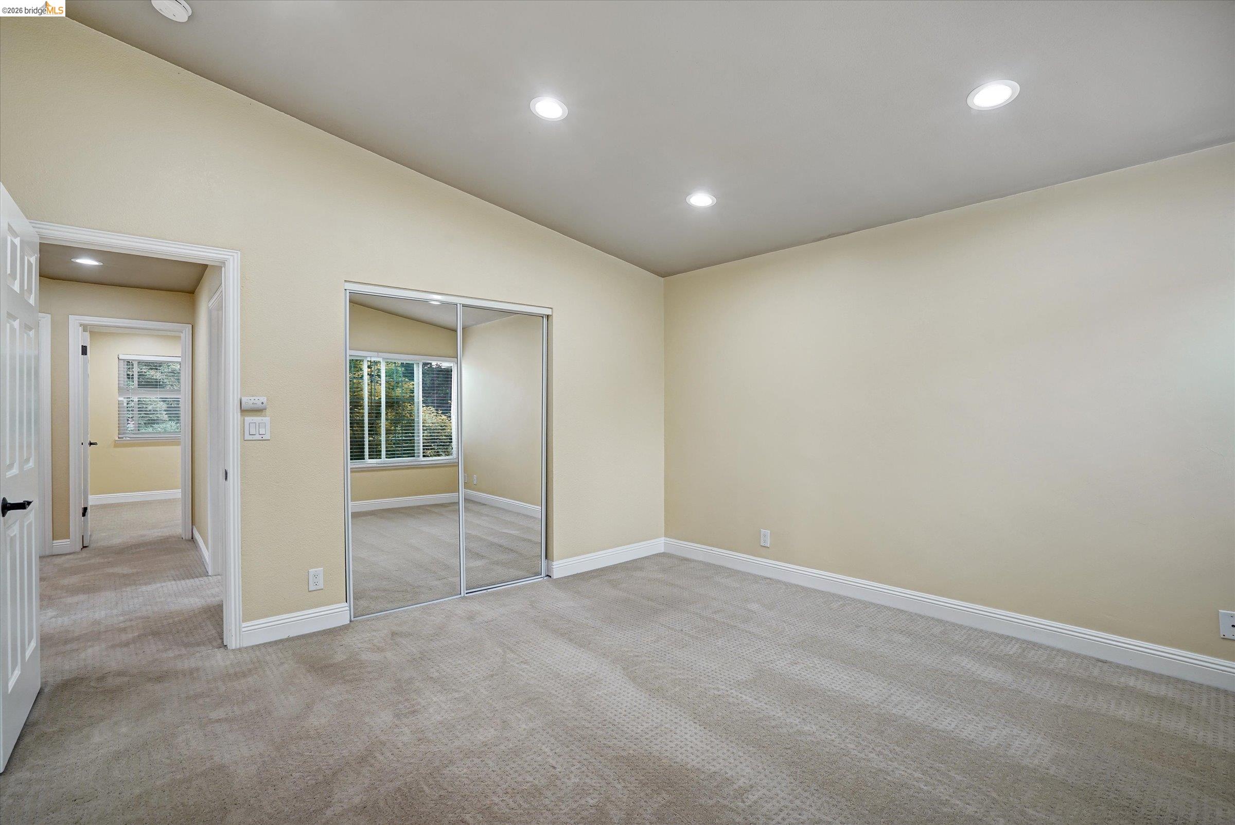 108 Castleton Court San Ramon, CA 94583 - Photo 25 of 41 Unfurnished bedroom with recessed lighting, a closet, lofted ceiling, and light carpet
