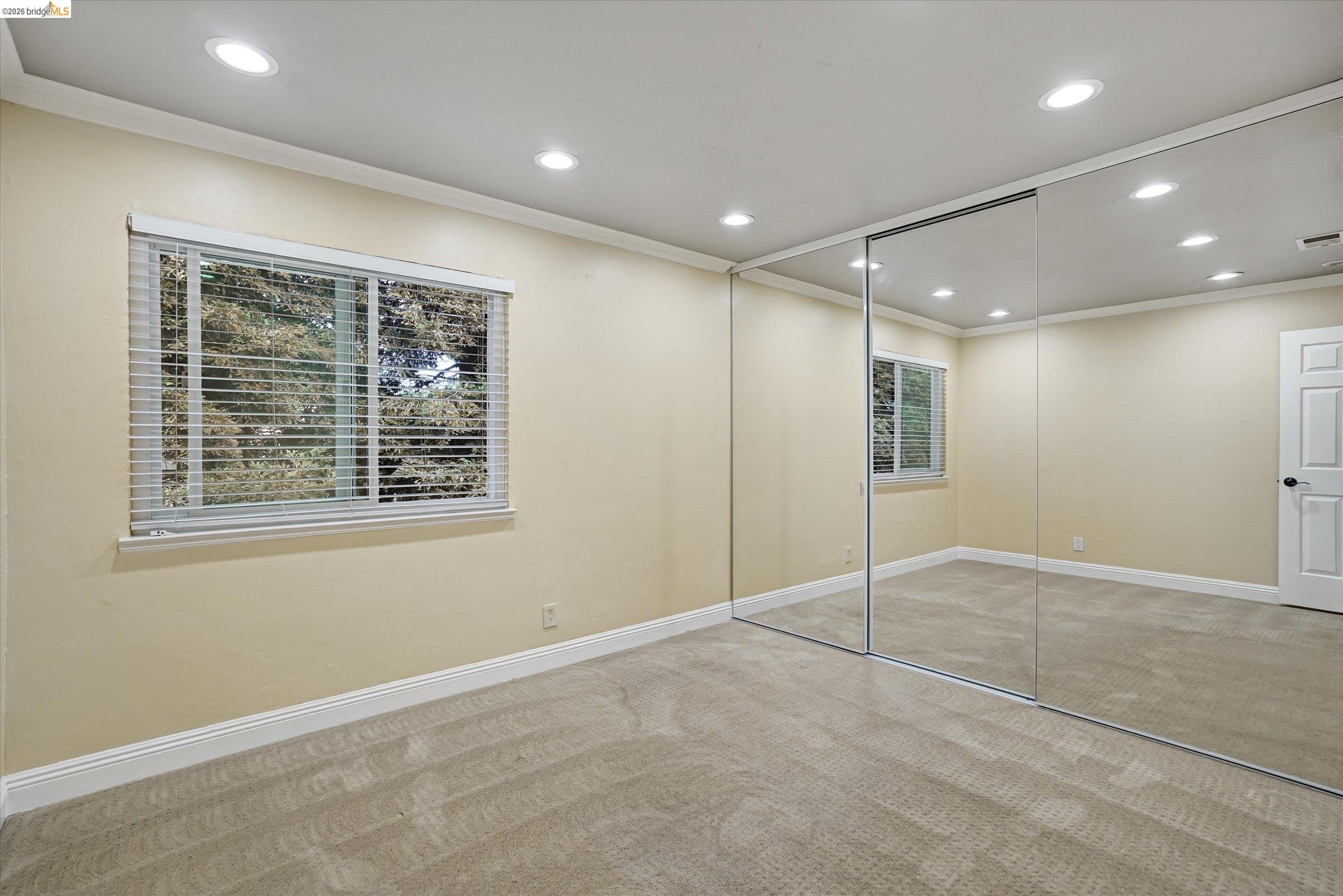 108 Castleton Court San Ramon, CA 94583 - Photo 31 of 41 Unfurnished bedroom with carpet, recessed lighting, ornamental molding, and a closet