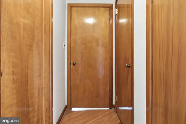 a view of a bathroom with a glass door and shower