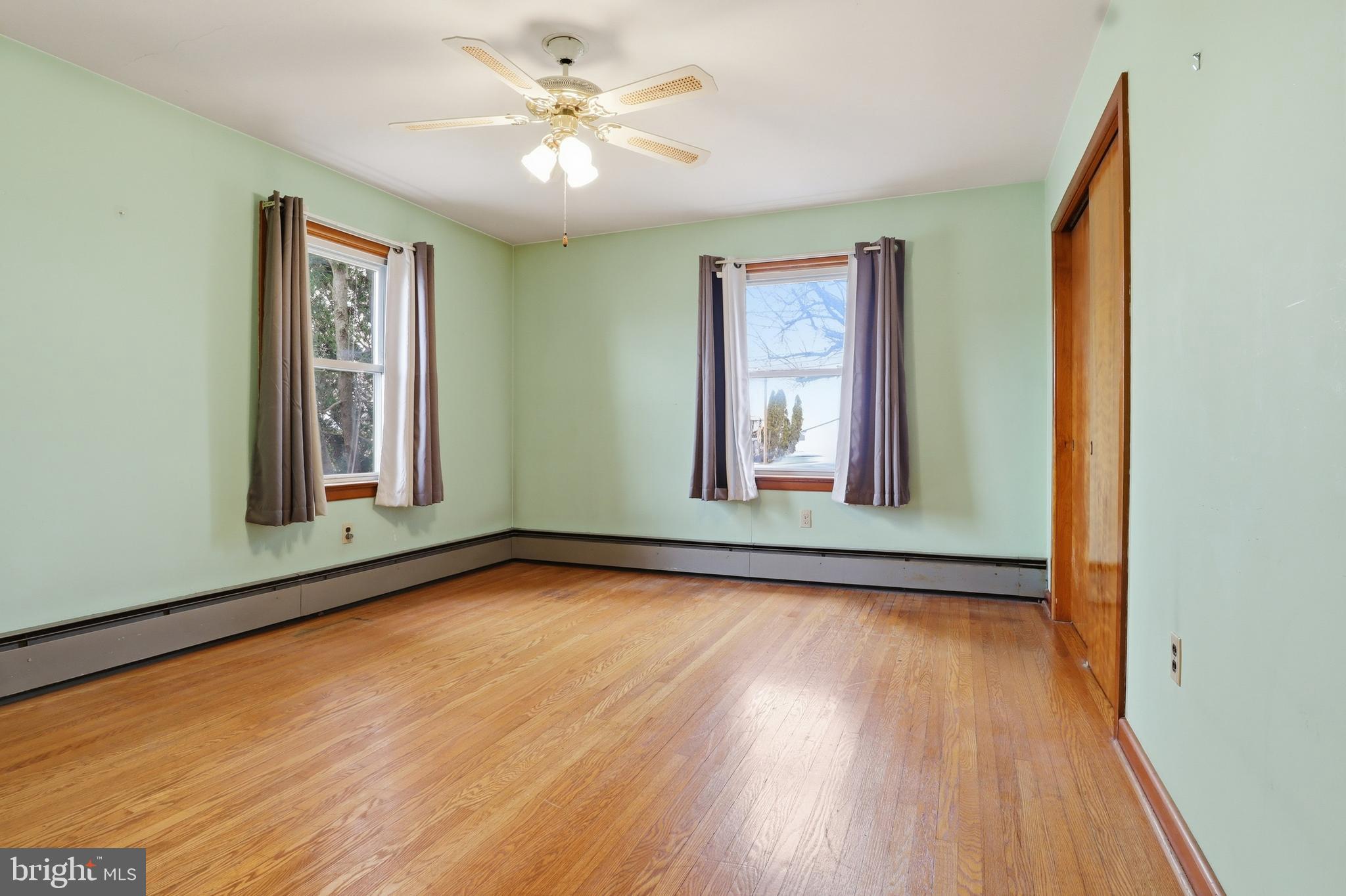 3570 Carlisle Road Dover, PA 17315 - Photo 19 of 49 a view of an empty room with window and wooden floor