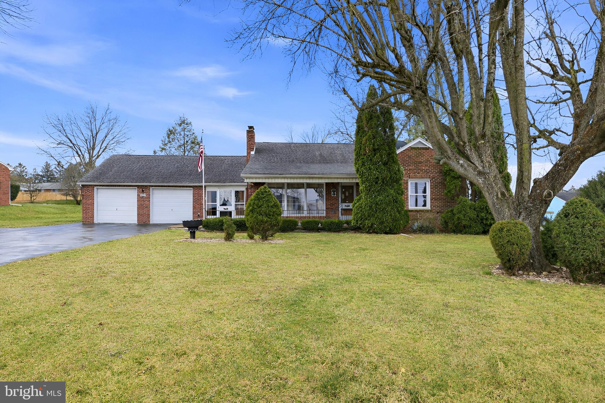 3570 Carlisle Road Dover, PA 17315 - Photo 3 of 49 a front view of a house with a yard