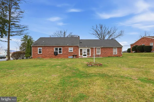 a view of a house with a big yard