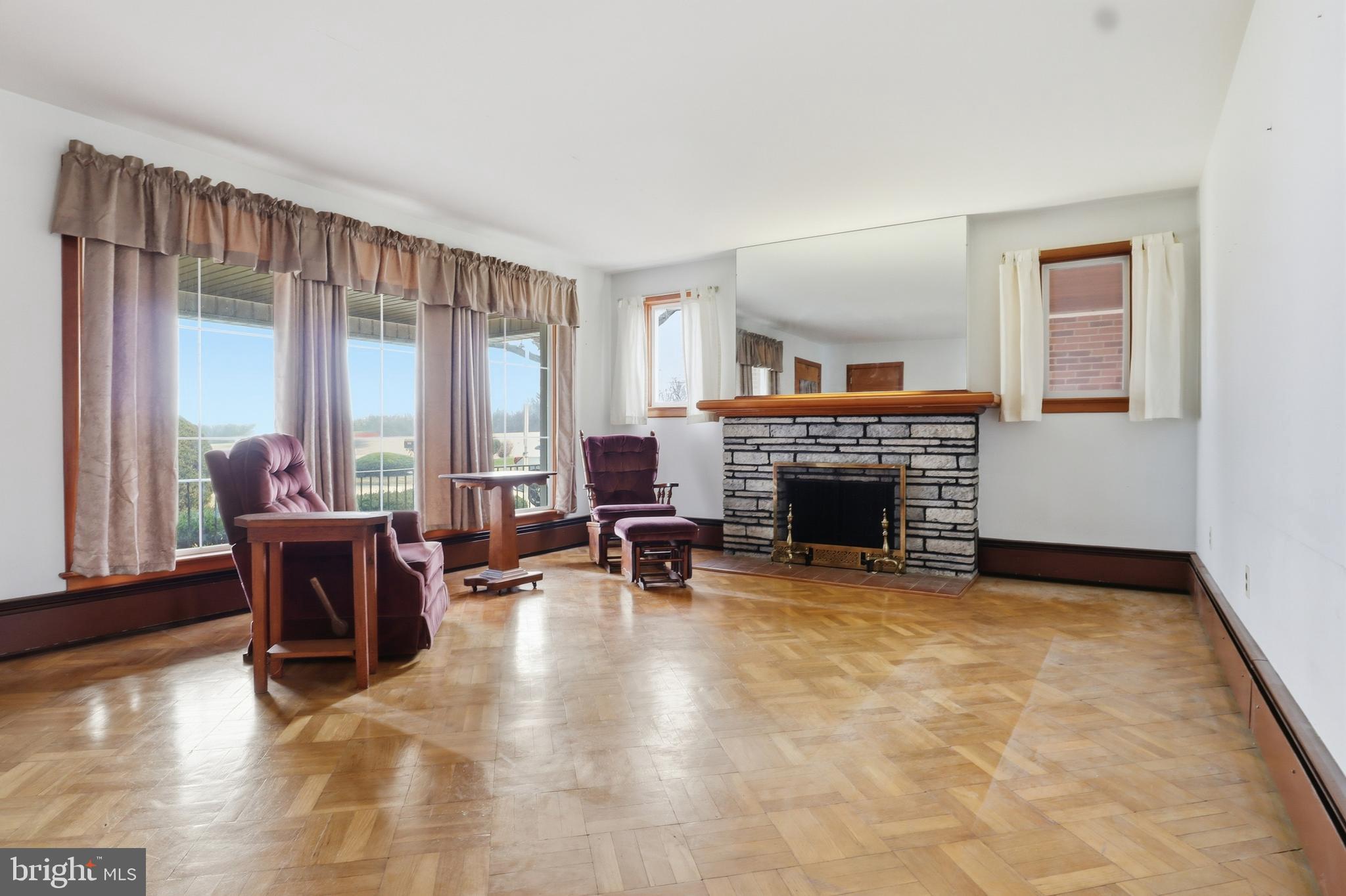 3570 Carlisle Road Dover, PA 17315 - Photo 6 of 49 a living room with furniture and a fireplace