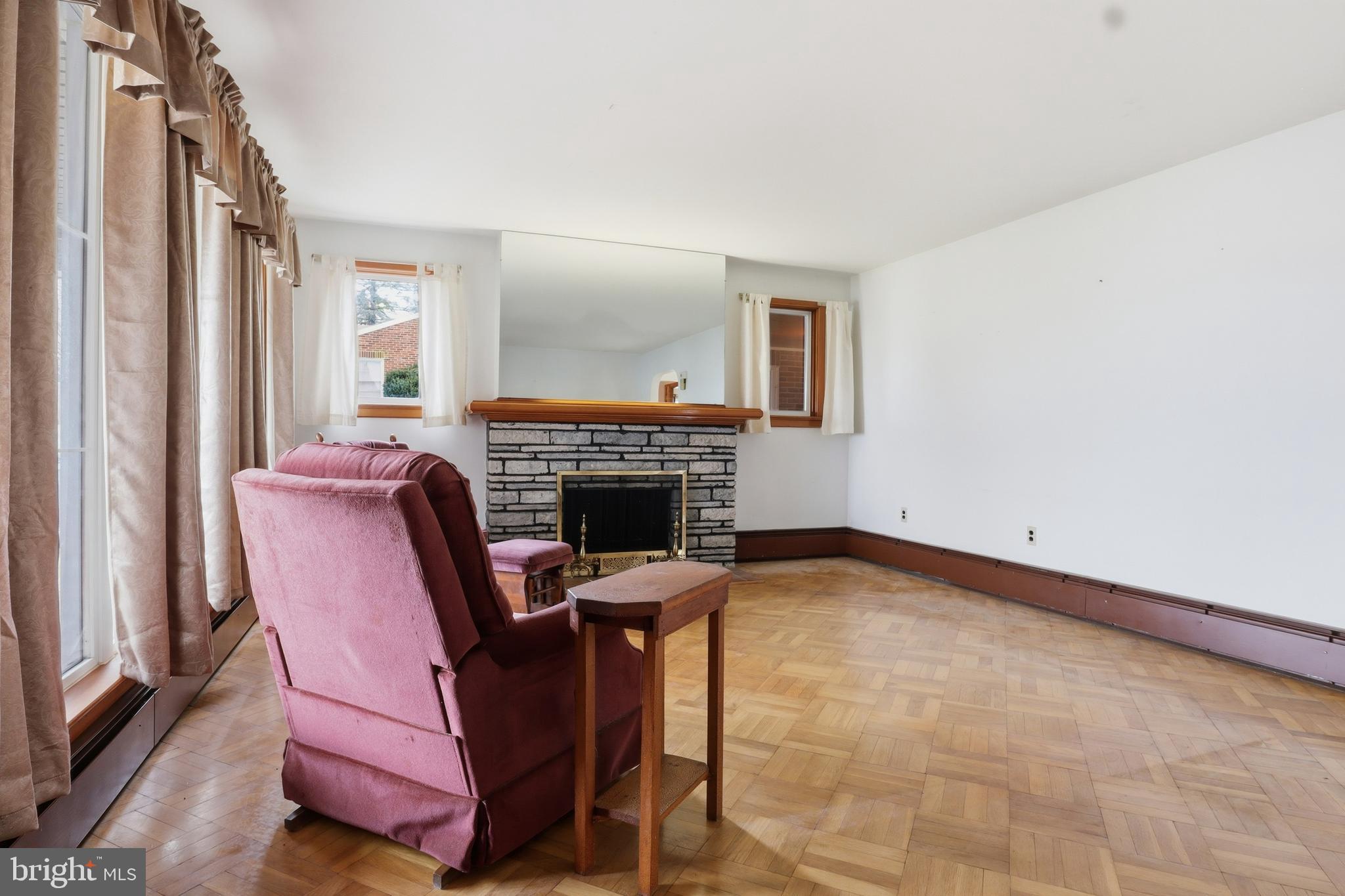 3570 Carlisle Road Dover, PA 17315 - Photo 7 of 49 a living room with furniture and a fireplace