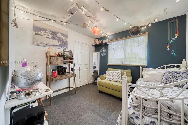 a bedroom with furniture and a couch