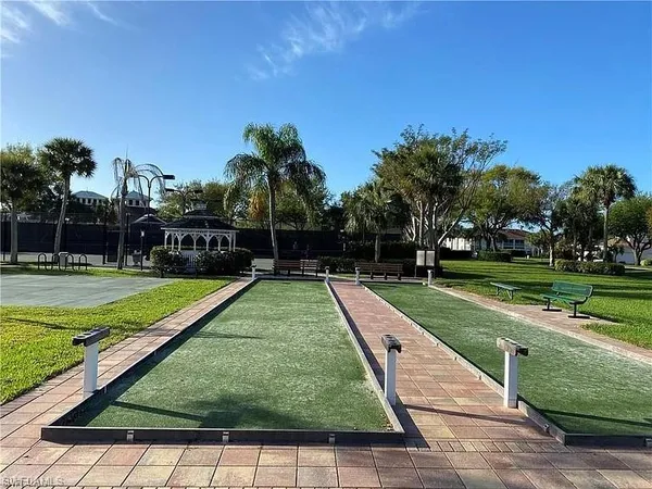 a view of swimming pool with a yard