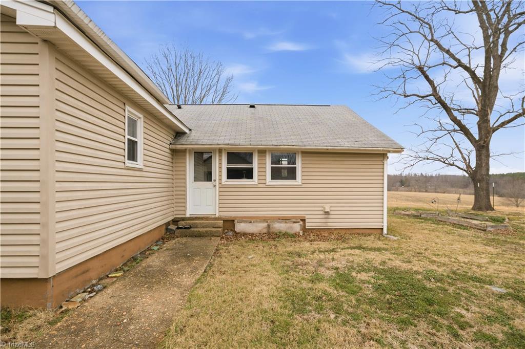 1149 Quaker Church Road Siloam, NC 27047 - Photo 18 of 47 Back and side of home