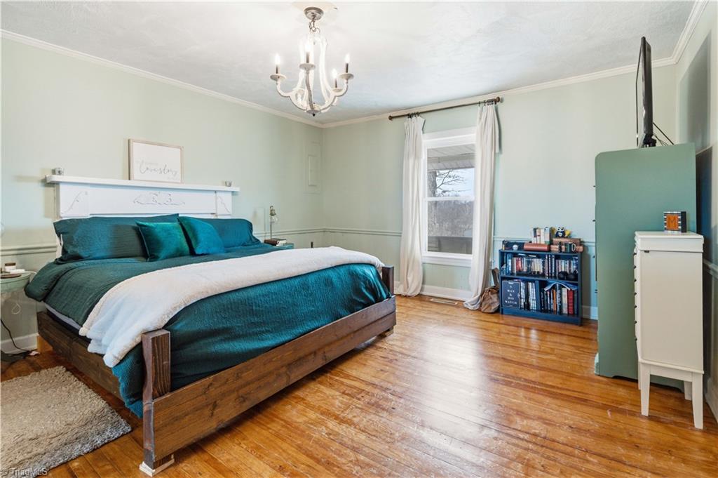 1149 Quaker Church Road Siloam, NC 27047 - Photo 35 of 47 Primary bedroom