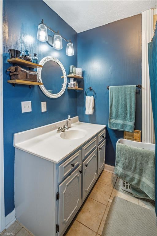 1149 Quaker Church Road Siloam, NC 27047 - Photo 38 of 47 Primary bathroom