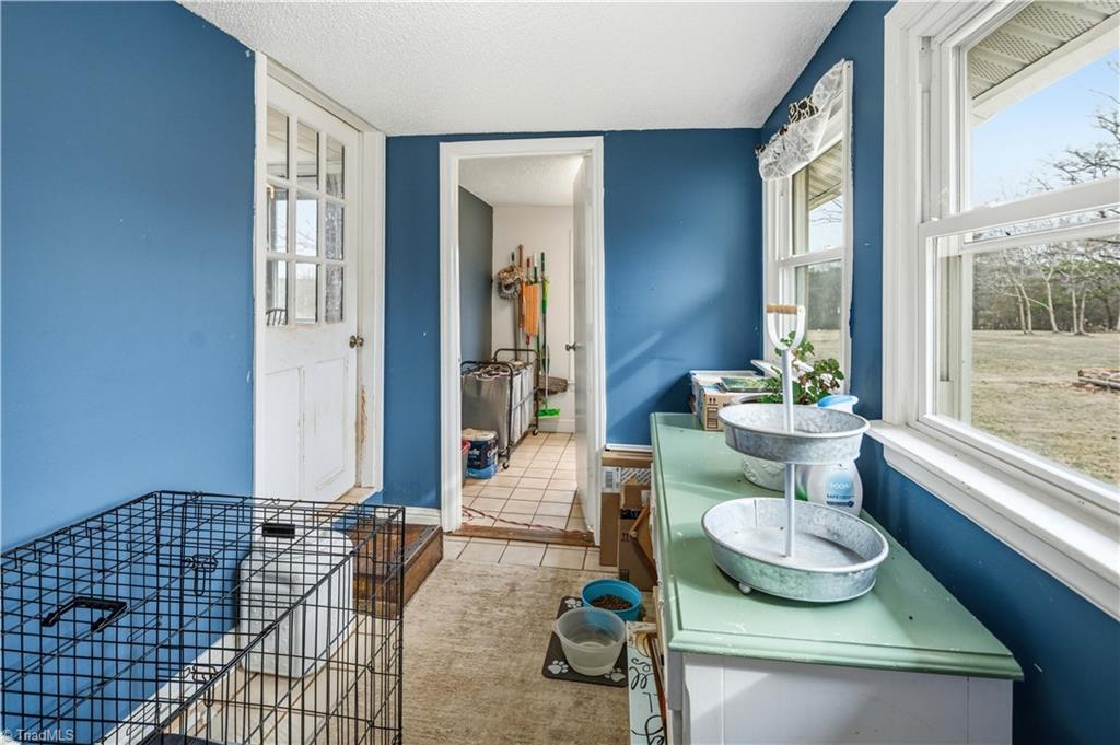 1149 Quaker Church Road Siloam, NC 27047 - Photo 47 of 47 Enclosed back porch