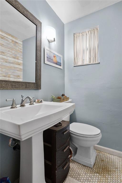 314 Rockfield Road Pittsburgh, PA 15243 - Photo 11 of 21 a bathroom with a sink toilet and mirror