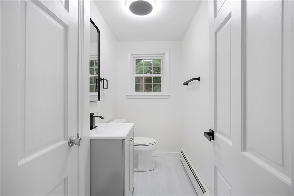 34 Carleton Road Hingham, MA 02043 - Photo 15 of 35 a bathroom with a sink toilet and shower