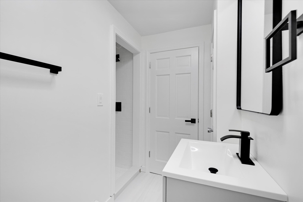 34 Carleton Road Hingham, MA 02043 - Photo 16 of 35 a bathroom with a sink