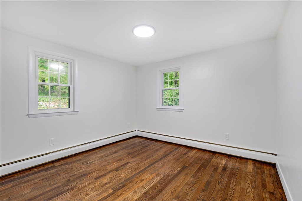 34 Carleton Road Hingham, MA 02043 - Photo 17 of 35 an empty room with a window